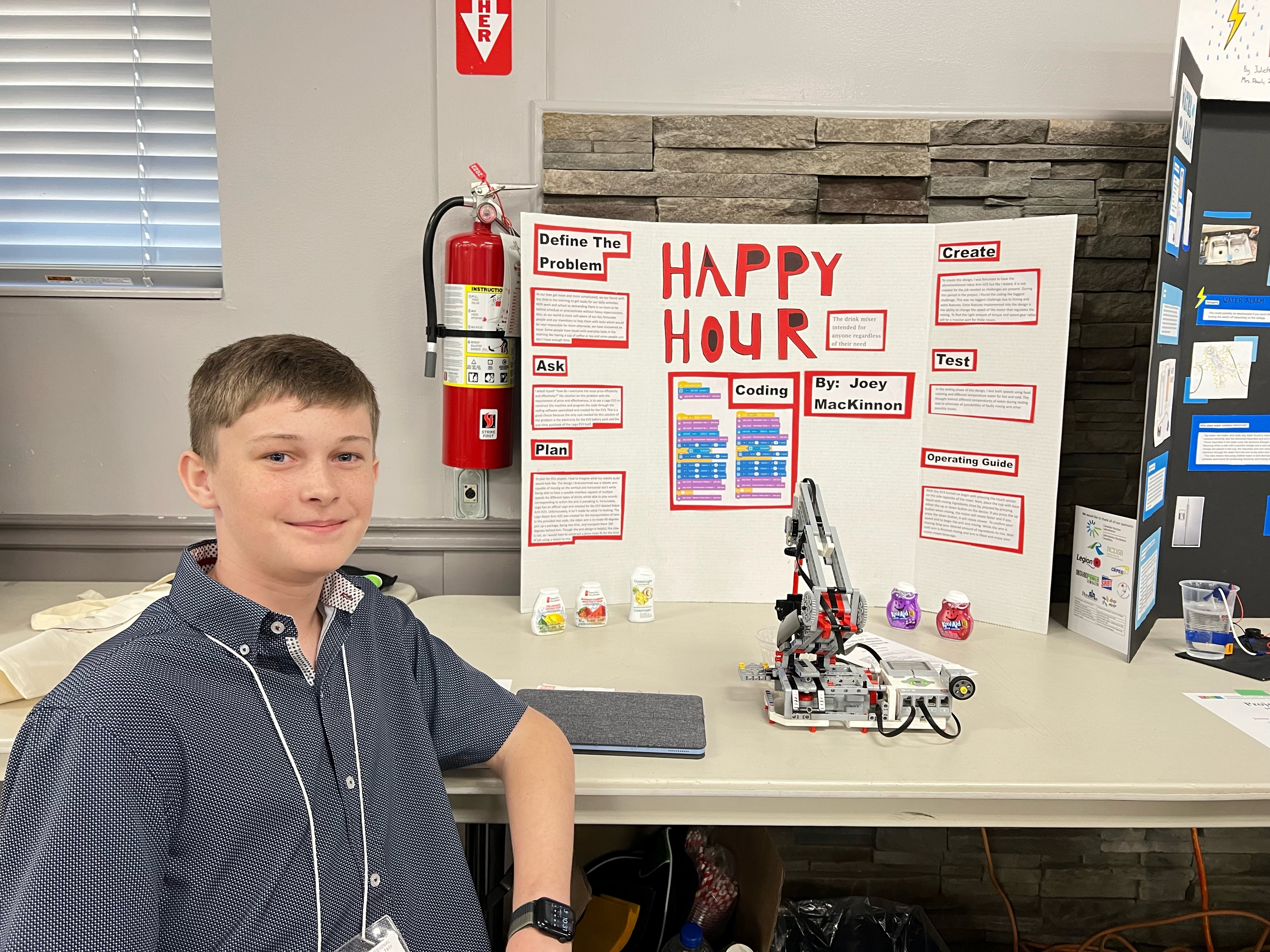 science fair boy with science project